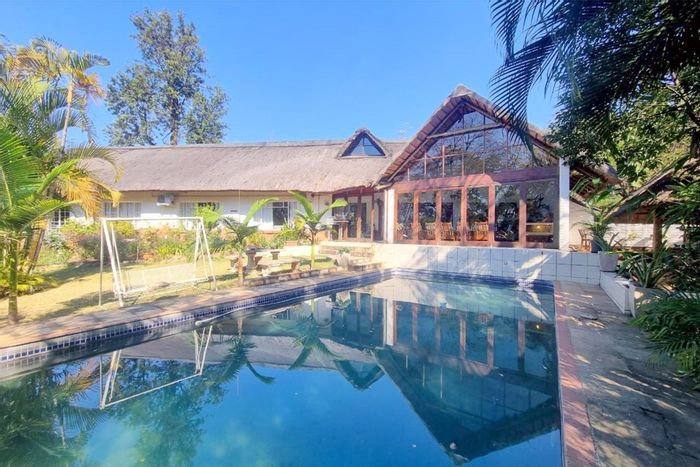 Spacious house with pool, lapa, guest cottage, and office in Nelspruit Ext 2. For Sale.