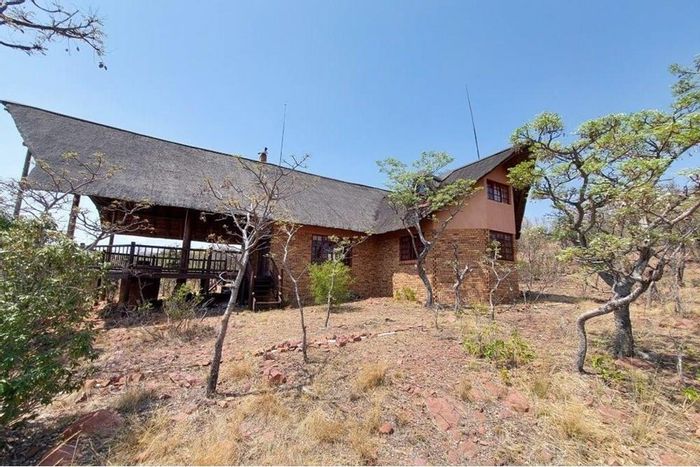 Lodge for Sale in Bela Bela Rural: Nature reserve, 4 bedrooms, off-grid amenities.