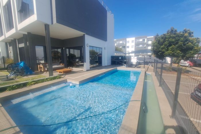 For Sale: Tenant-occupied duplex in Carlswald with 3 bedrooms, parking, and convenience.