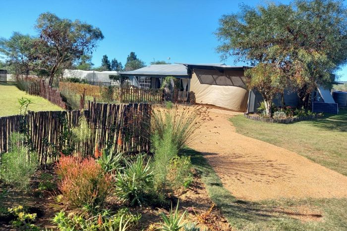 For Sale: Off-grid small holding in Albertinia Central with extensive amenities and security.