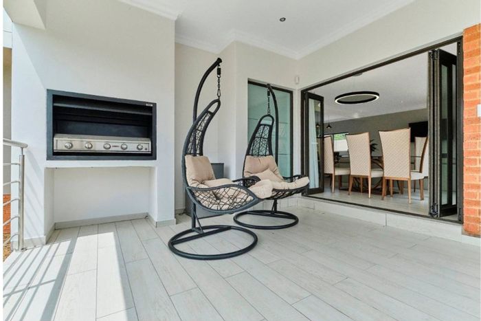 For Sale: Bryanston Townhouse with 4 en-suite bedrooms, private garden, and secure estate.