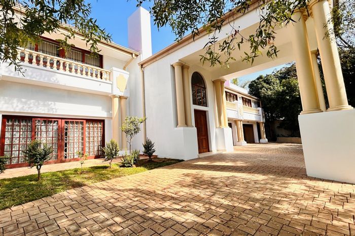 For Sale: House in Waterkloof with pool, flatlet, and five garages.