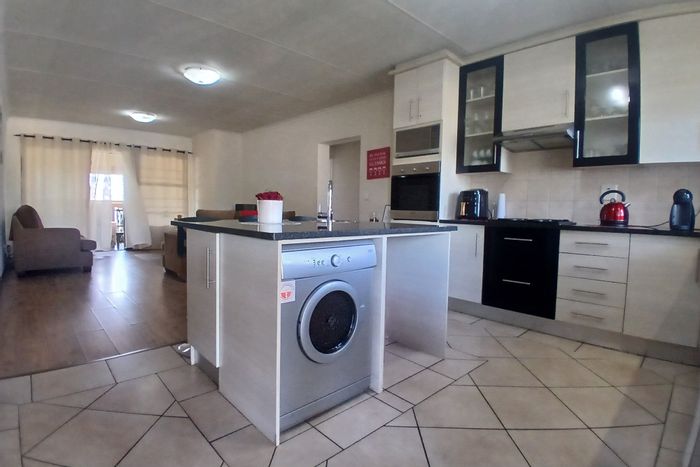 2-Bedroom Apartment For Sale in North Riding with Pool, Balcony, and Parking.