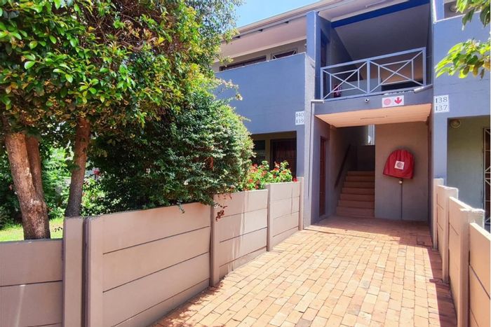 Apartment for Sale in Rynfield AH: 2 Bedrooms, Parking, Near Amenities.