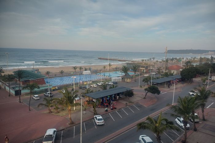 North Beach Apartment For Sale: Ocean views, 2 beds, security, parking, near amenities.