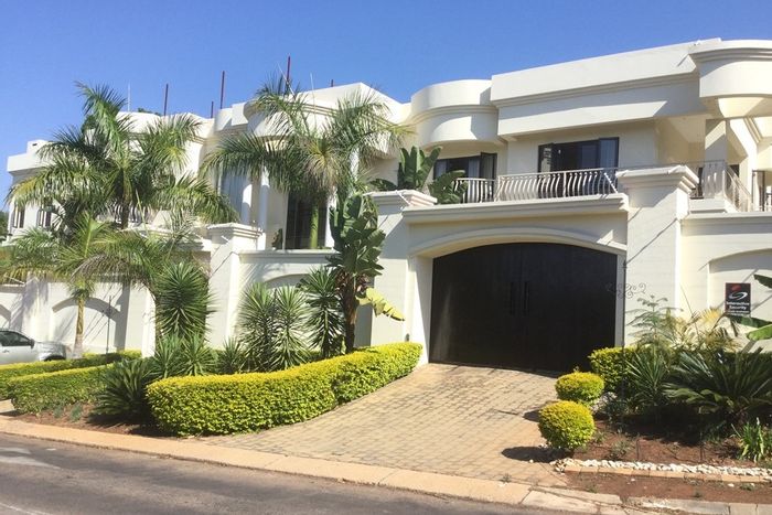 For Sale: House in Waterkloof Ridge with pool, wine cellar, and guest cottage.