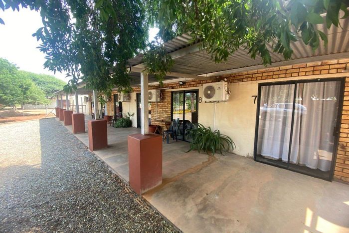 For Sale: Thabazimbi Rural Farm with guest chalets, fitness center, and game wildlife.