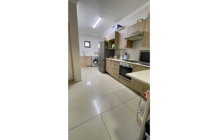 2-Bedroom Apartment To Rent in Halfway Gardens with balcony, parking, and security.