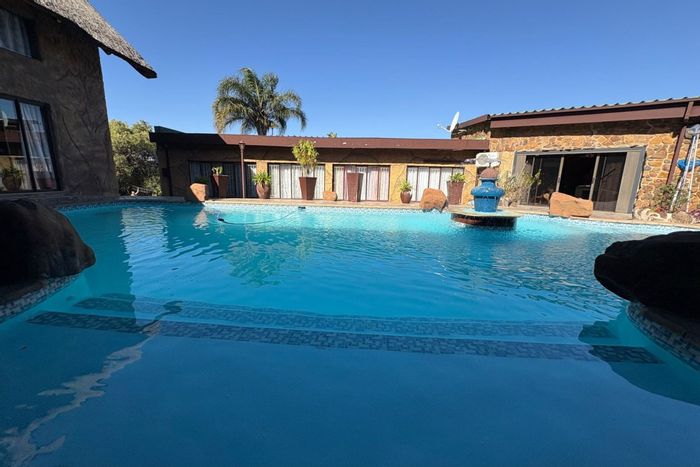 For Sale: Spacious Signal Hill house with pool, guest suite, and mountain views.