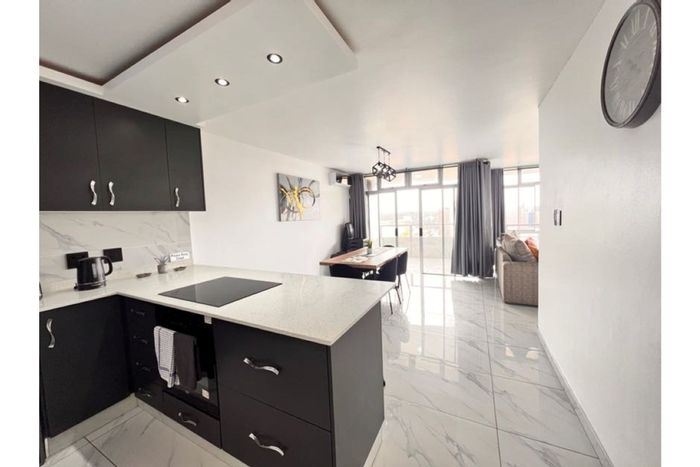 For Sale: 2-bedroom apartment in South Beach with pool, balcony, and parking.