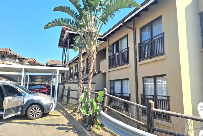 Townhouse For Sale in Palmiet: Secure estate, garage, balcony, close to amenities.