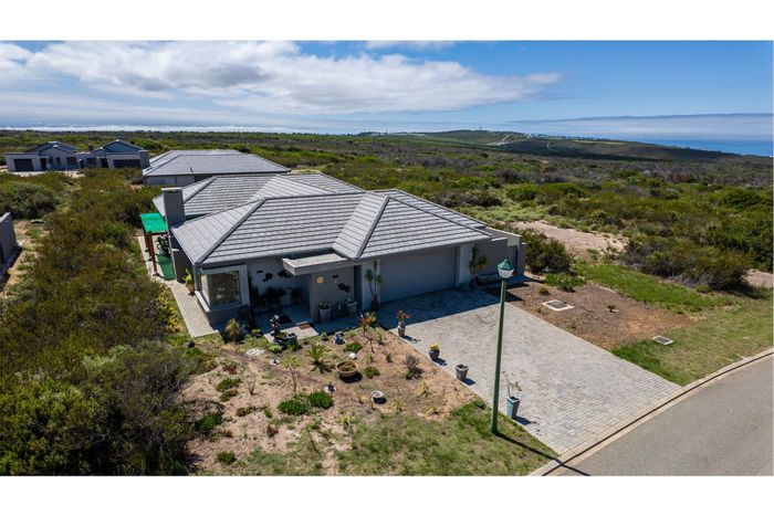 For Sale: House in Paradise Coast with sea views, secure estate, and eco-friendly features.
