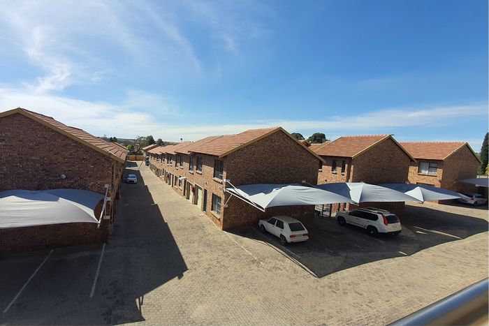 Secunda Central House For Sale: 56-unit complex with secure parking and communal spaces.