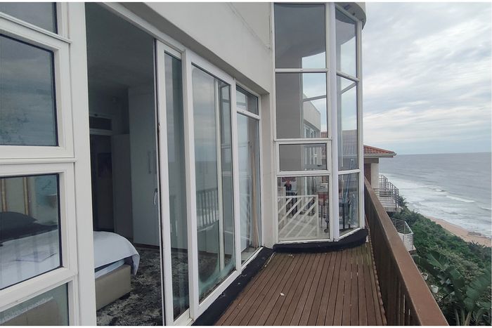 For Sale: Beachfront House in Bluff with 7 bedrooms, garden, and staff accommodation.