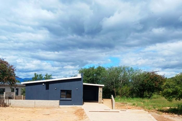 Eco-friendly townhouse in Hoedspruit Central with customizable interiors and off-grid features. For Sale.