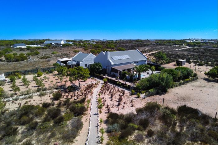 Long Acres Country Estate Farm For Sale: Privacy, game camp, pool, and expansive land.