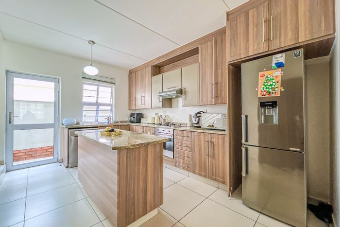 For Sale: 3-Bedroom Townhouse in Fourways with garden, patio, and mini golf green.