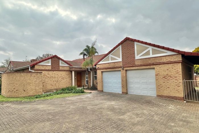 For Sale: Aviary Hill Townhouse with pool, study, braai area, and double garage.