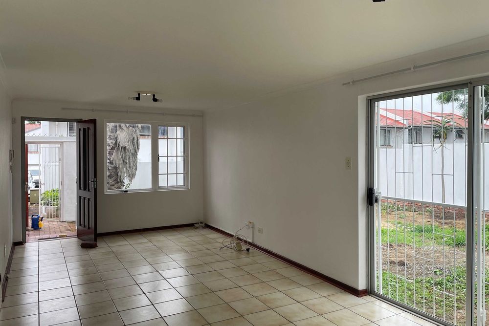 Spacious lounge leading out to garden