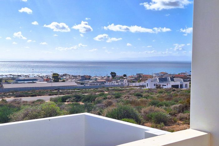 Eco-friendly house in St Helena Views, for sale with ocean views and security.