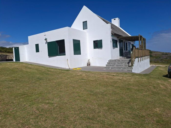 Farm for Sale in Stilbaai Rural: Share ownership, ocean views, hiking trails, eco-estate.
