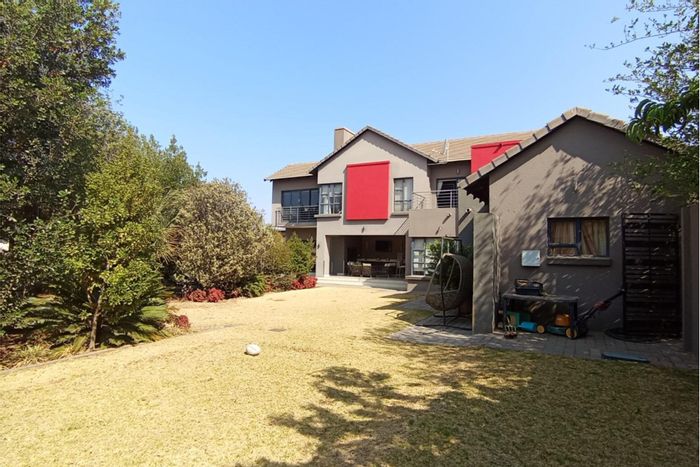 For Sale: 6-Bedroom House in Midstream Estate with garden, braai area, and security.