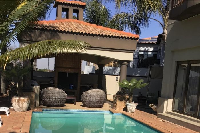 For Sale: 4-Bedroom House in Sunward Park with pool, theatre, and solar power.