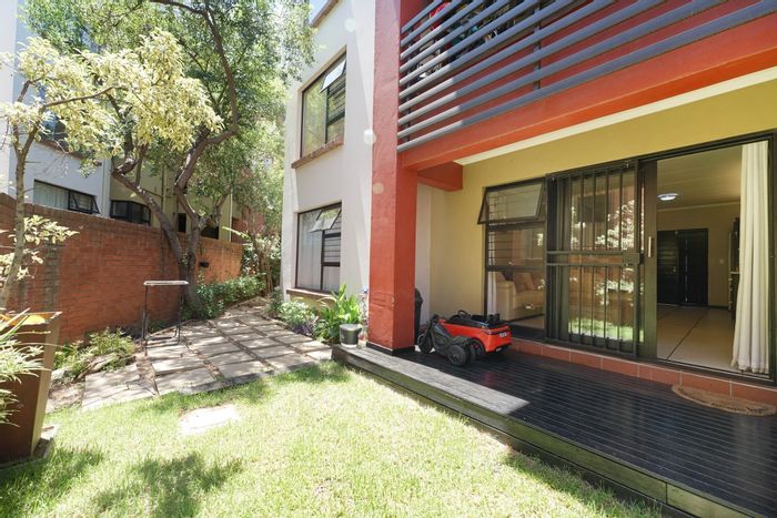 For Sale: 2-bedroom apartment in Douglasdale with private yard and clubhouse access.