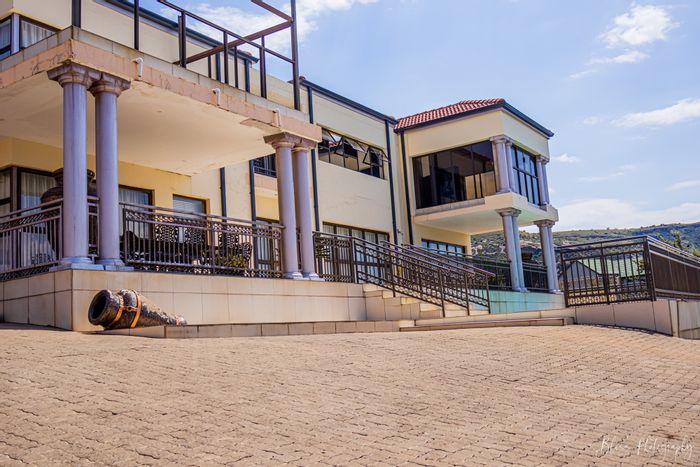 For Sale: Spacious 8-bedroom house with pool in Clarens Central, ample land.