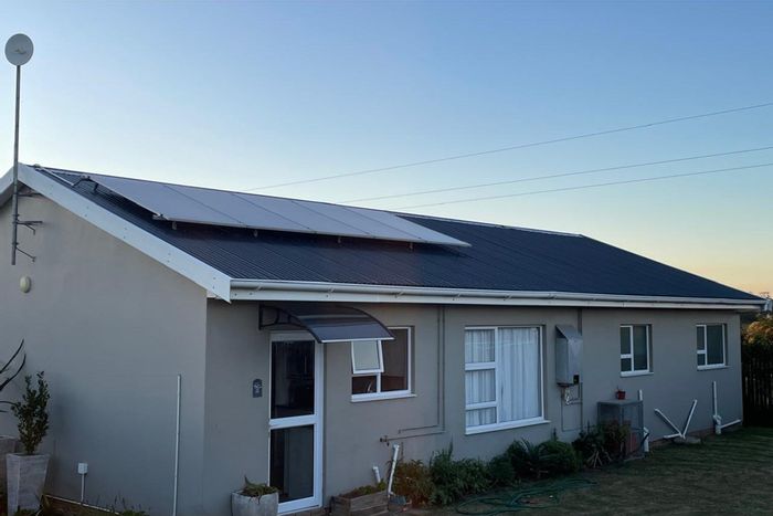 Eco-Friendly House for Sale in Queensberry Bay with Beach Access and Off-Grid Features.