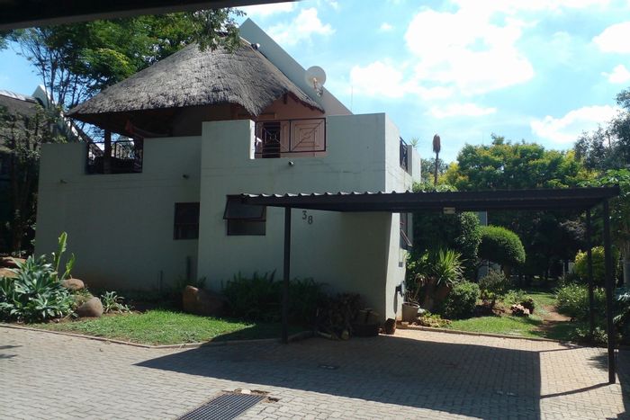 Charming Sharonlea townhouse for sale with pool, security, and rooftop terrace.