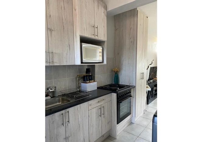 For Sale: Bachelor Apartment in Sasolburg Central, close to amenities, garage included.