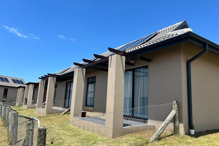 For Sale: House in Kidds Beach with 2 bedrooms, secure estate, and rental income.