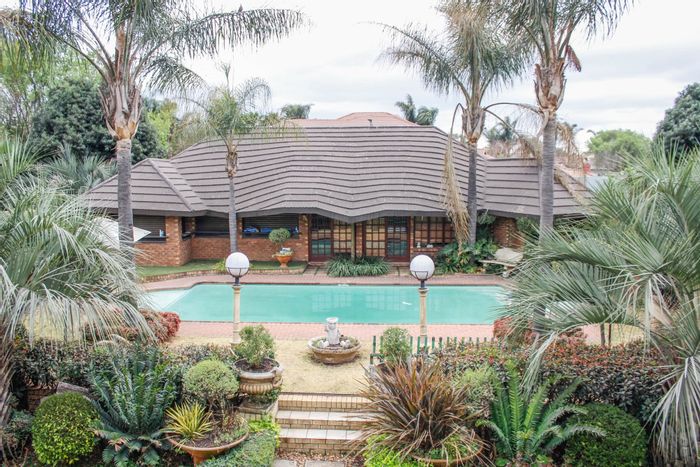 Aerorand House For Sale: Multi-home estate with pool, gardens, and entertainment areas.