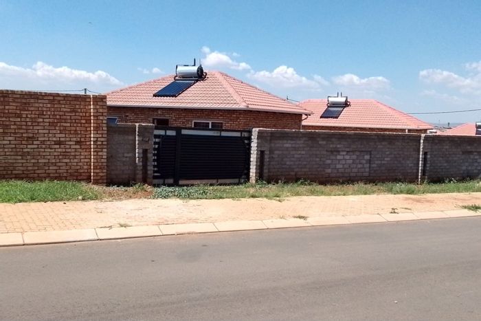 For Sale: House in Lufhereng with 2 bedrooms, walled yard, and development potential.