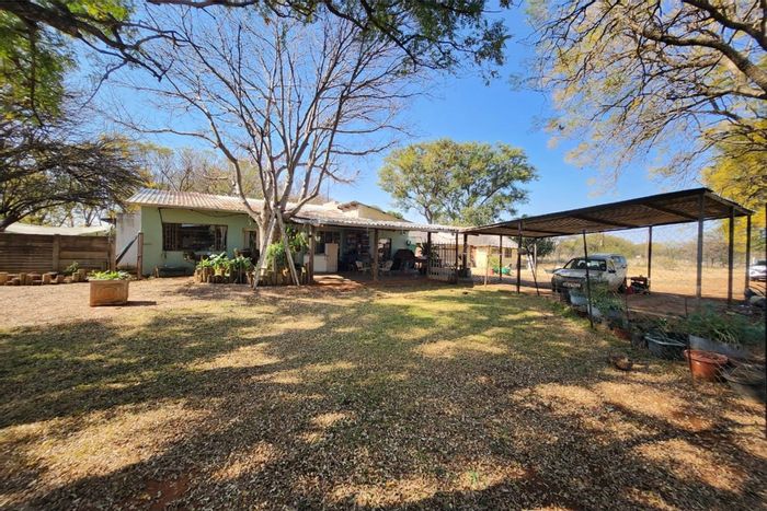 Bela Bela Central Small Holding For Sale: 8.5 hectares, cottages, solar power, farming potential.