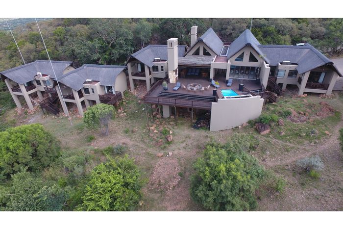 Mabula Private Game Lodge House For Sale: Five chalets, pool, game reserve access.