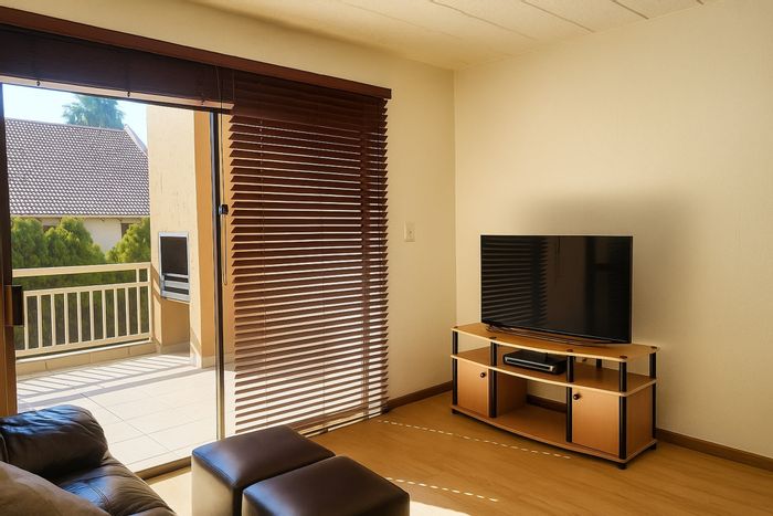 For Sale: Townhouse in Bedford Gardens with pool, braai, and 24/7 security.