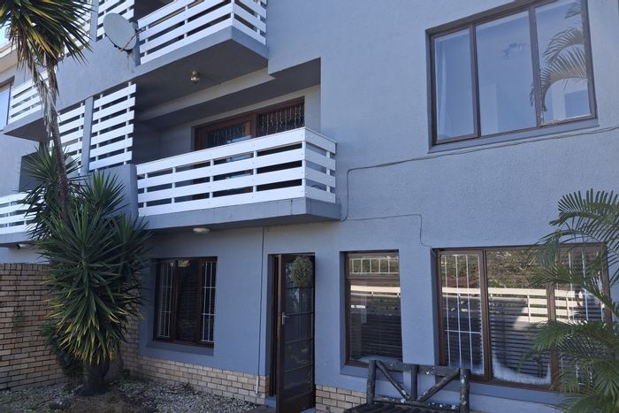 Beacon Bay House For Sale: Gated complex, open plan living, balcony, garage.