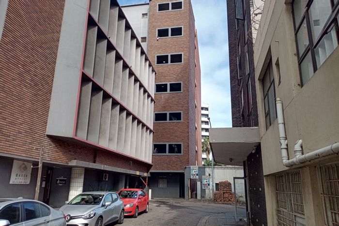 1-Bedroom Apartment For Sale in Durban Central with security, parking, and amenities.