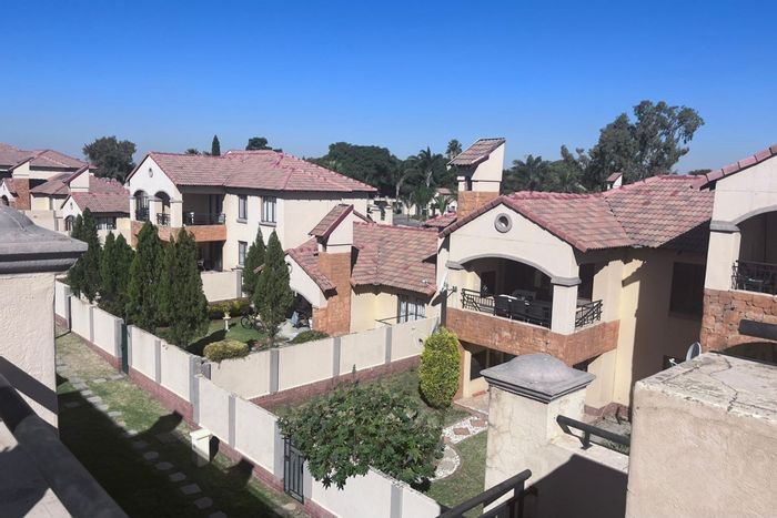 2-Bedroom Apartment For Sale in Halfway Gardens with parking, balcony, and security.