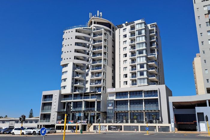 Penthouse for Sale in Table View: Ocean views, rooftop pool, gym, 24-hour concierge.