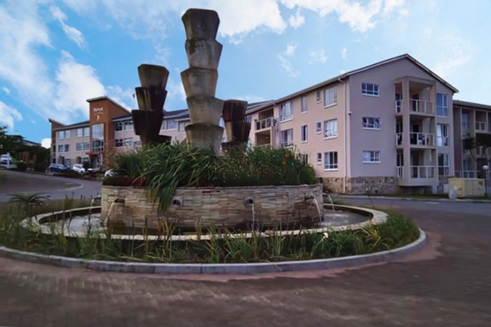 Beacon Bay Apartment For Sale: Private balcony, pool access, secure parking, and storage.