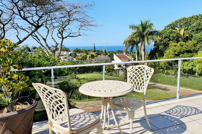 House for Sale in Uvongo: 5 bedrooms, pool, rainwater tanks, and sea views.