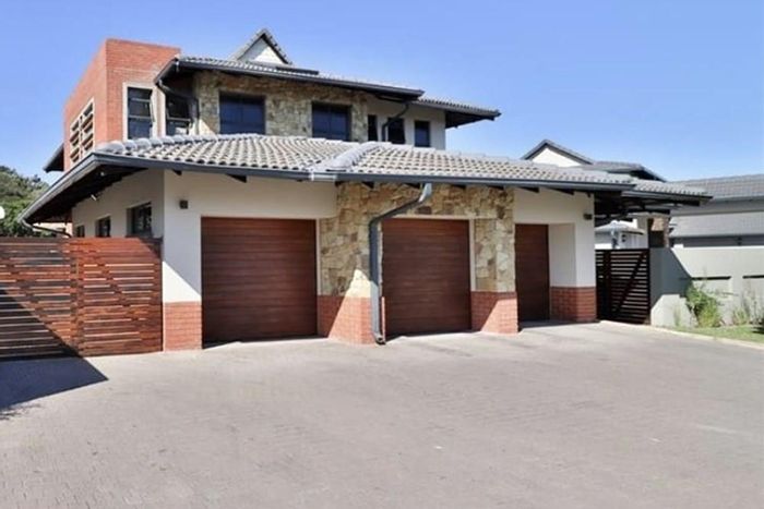 For Sale: House in Mzingazi Golf Estate with 4 beds, pool, and 3 garages.