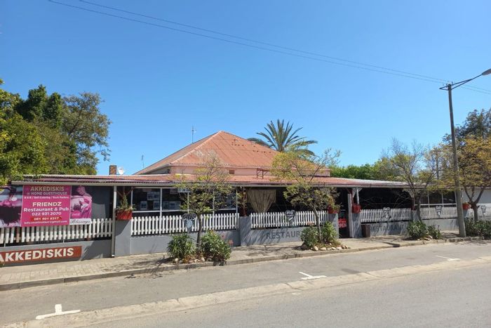 For Sale: Porterville Central Lodge with diverse accommodations, restaurant, and bar amenities.