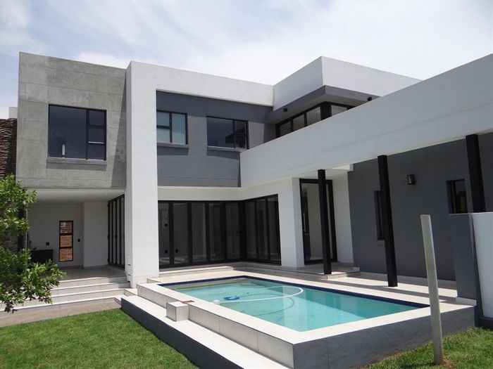 For Sale: House in Midstream Estate with 4 beds, pool, and double garage.