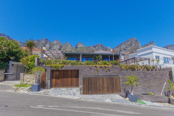 Camps Bay House For Sale: Ocean views, multiple income units, prime investment opportunity.