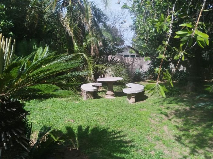 For Sale: House in Witbank Ext 8 with 3 bedrooms, garage, and garden.