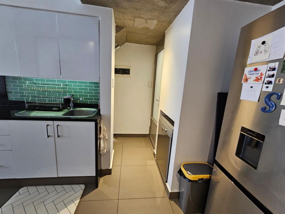 View toward bathroom and understair storage